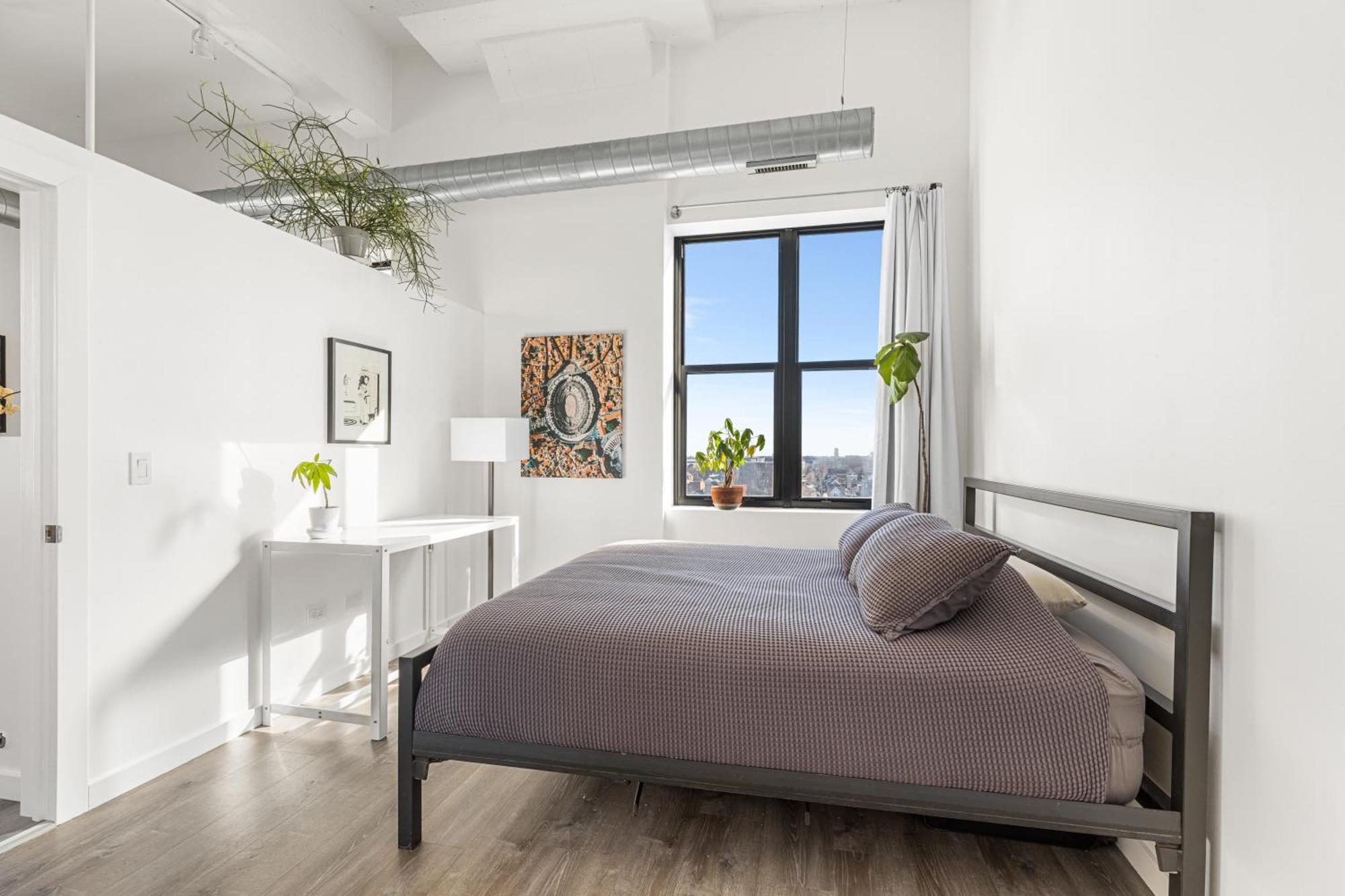Modern Historic Loft 19ft Ceilings, Gym, Heated Parking, Skyline Views, Balcony Apartment